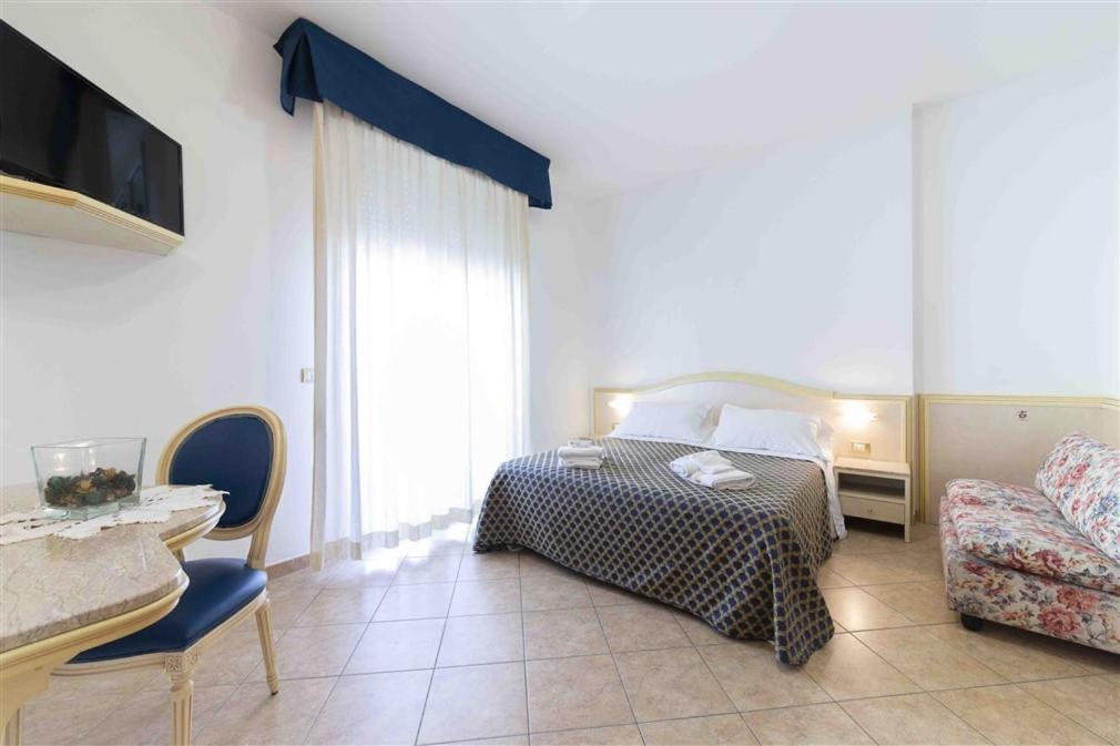 Residenza Melucci Aparthotel Rimini Exterior photo